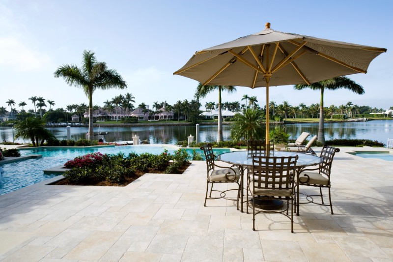 swimming pool area in a Palm Beach FL luxury waterfront home