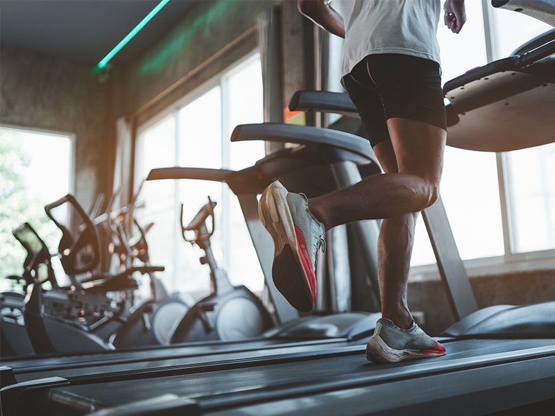 man walking in treadmill